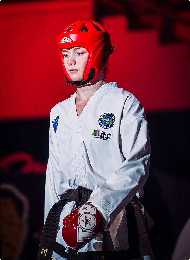 Taekwondo athlete in red headgear at ITF European Championships