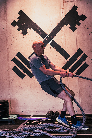 Athlete competing in a HYROX simulation