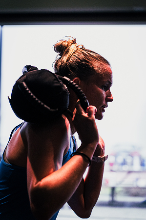Athlete competing in a HYROX simulation