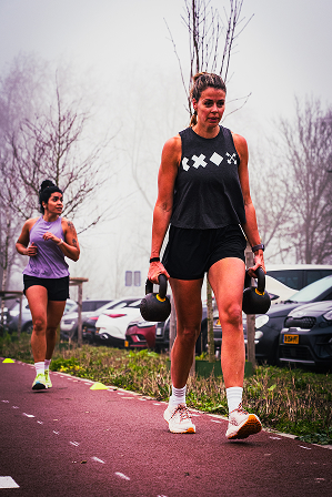 Athlete competing in a HYROX simulation