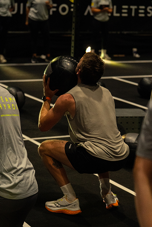 Athlete competing in a HYROX simulation