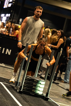 Athlete competing in a HYROX simulation